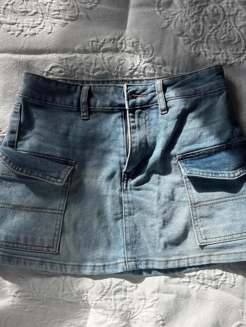 Low rise mini denim skirt